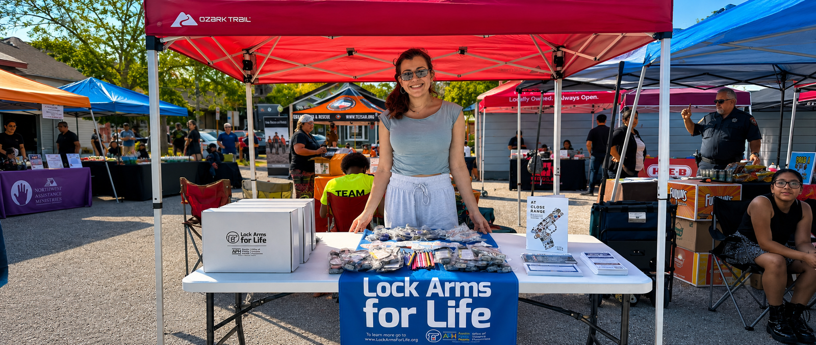 Amelia providing free gun locks and safety resources at a community event