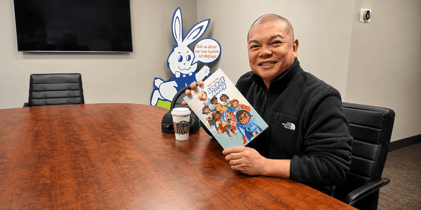 Lock Arms for Life illustrator Sherwin presenting the Save the Day, Lock It Away firearm safety graphic novel