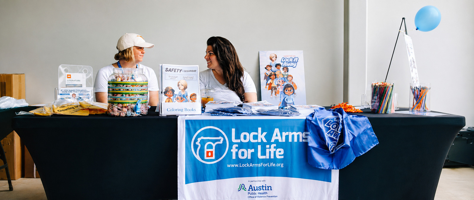 Lock Arms for Life educational materials helping families learn responsible firearm storage - Kim & Devon
