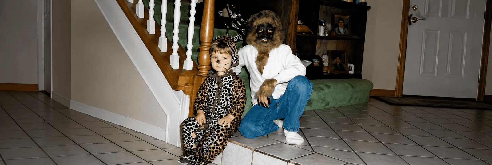 Childhood photo of Jon dressed in costume with a family member