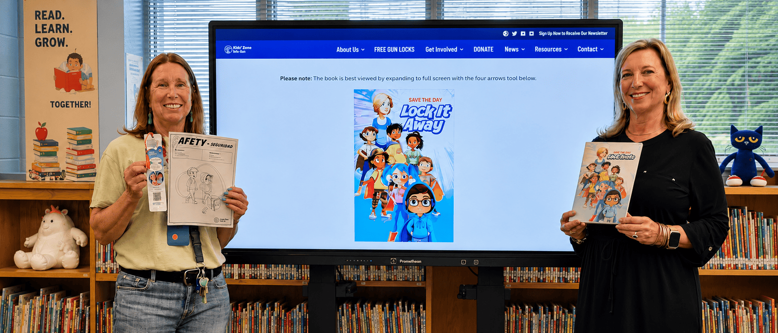 Two librarians presenting Save the Day, Lock It Away graphic novels and firearm safety materials
